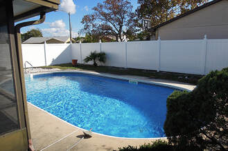 white-vinyl-pool-privacy-fence-contractor-panama-city-florida-fence-company